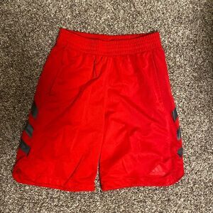 Red Adidas athletic shorts